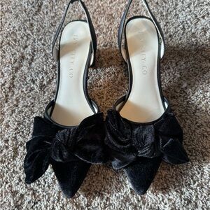 Ivy City Co Black Slingback Heels with Bow Accent